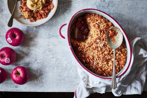 Pink lady apple crumble served with ice cream