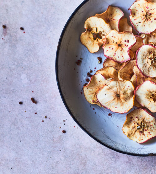 Pink Lady® apple crisps with pink peppercorns