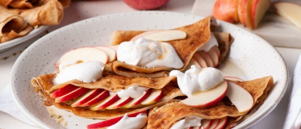 Vegan crepes with maple syrup and Pink Lady® apples